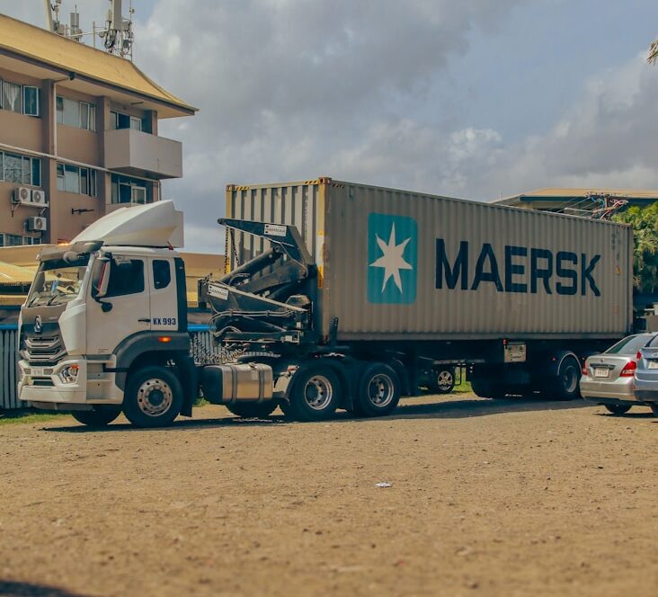 a semi truck with a large container on the back of it